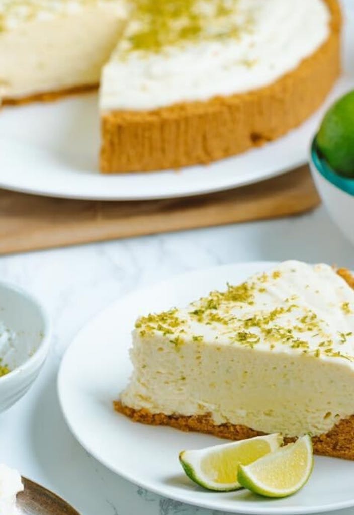 Sliced Key Lime Pie on White Ceramic Plate