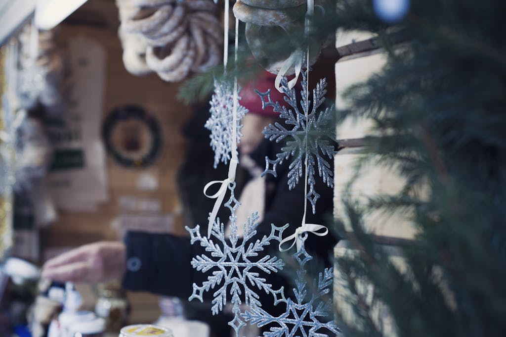 Shallow Focus Photography of Snowflakes Christmas Tree Decor